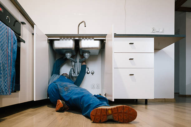 Professional Drain Cleaning technician working in Baldwin, NY